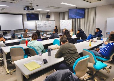 Graduate students deep in debate